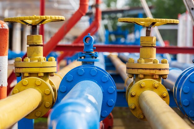 Close-up of pipes against blue sky