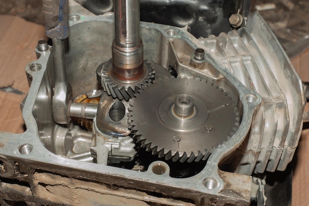 Close-up of piston and rings on the connecting rod. details of\
the car.