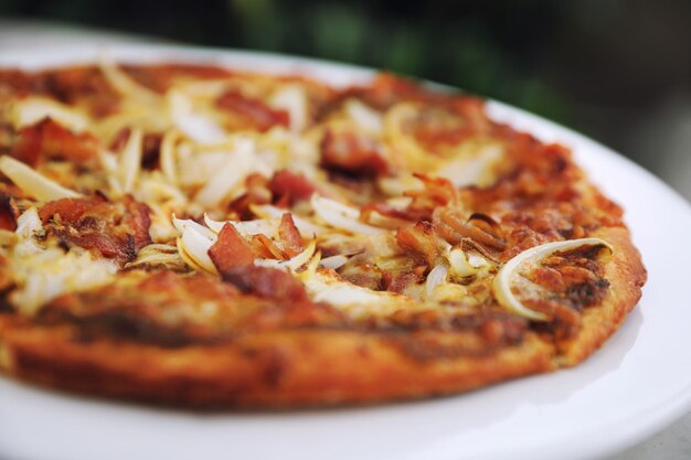 Photo close-up of pizza in plate