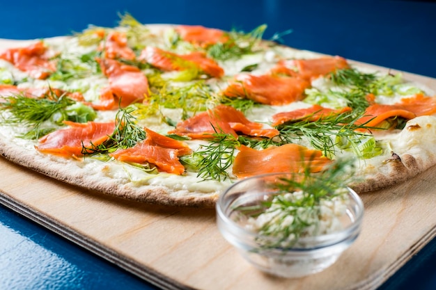 Close-up of pizza served on table