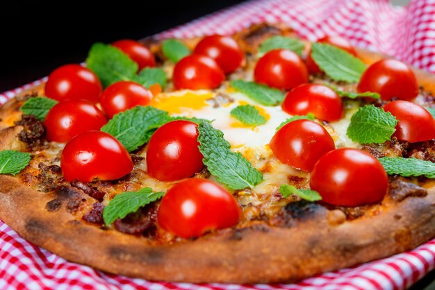 Photo close-up of pizza on textile