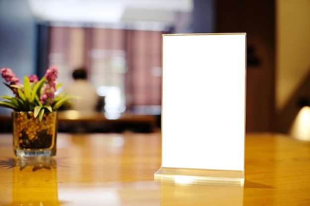 Photo close-up of place card on table