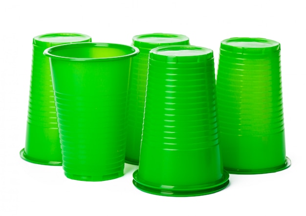 Close up of plastic cups for drinks isolated on white