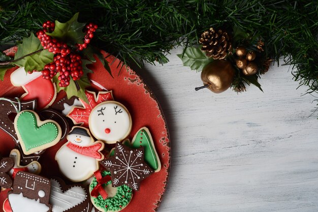 Close up of plate with colorful christmas cookies 