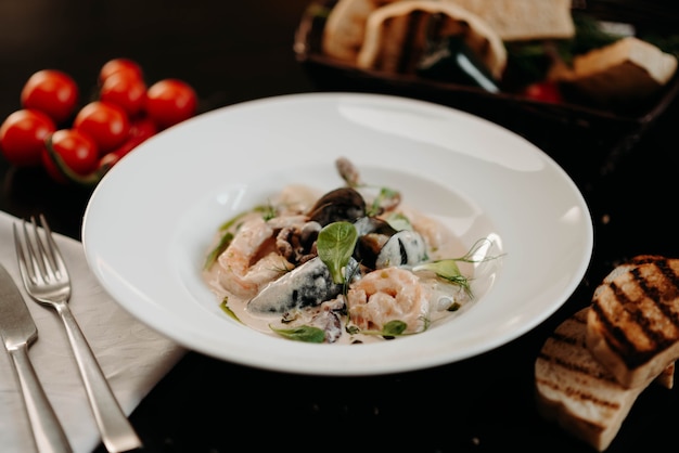 Close-up platter of shrimp and mussels on the white plate