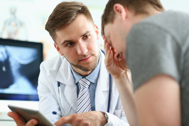 Close up of pleased doctor that examining his patient