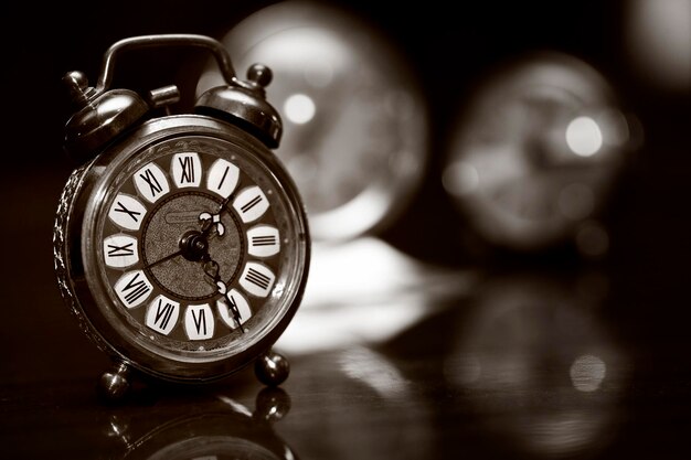 Close-up of pocket watch on table