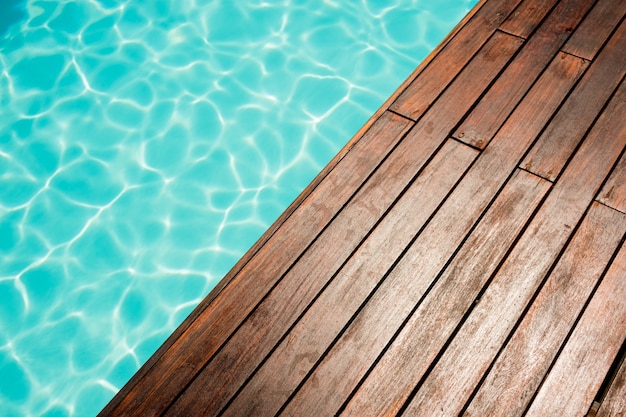 Close up of Pool and wooden floor beside it