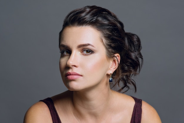 Close up portrait of attractive brunette woman