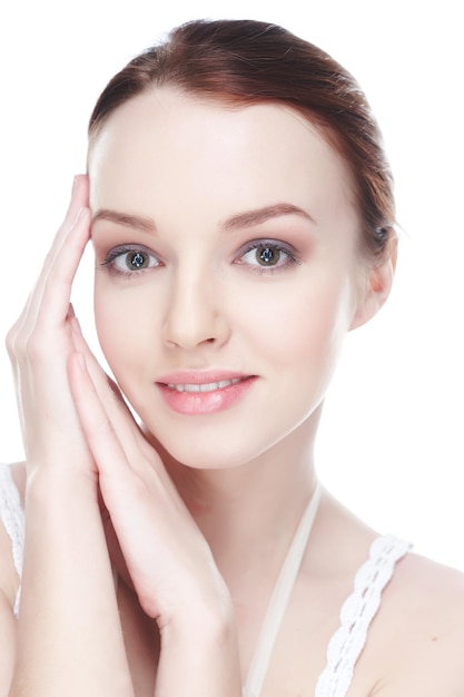 Close-up portrait of awesome brunette woman isolated on white background.