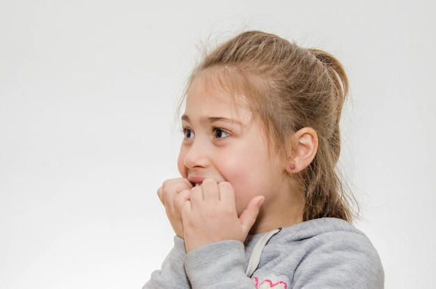 Close-up portrait of baby against white background