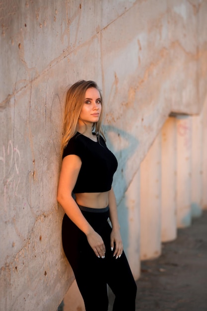 Close up of a portrait of a beautiful blonde woman looking at the camera