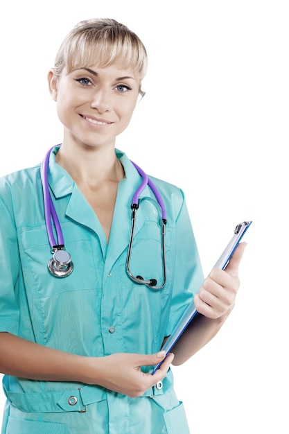 Close up portrait beautiful female doctor holding clipboard looking at camera smiling isolated
