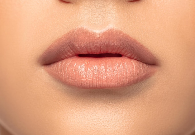 Close up portrait of beautiful jewish woman isolated on studio background.