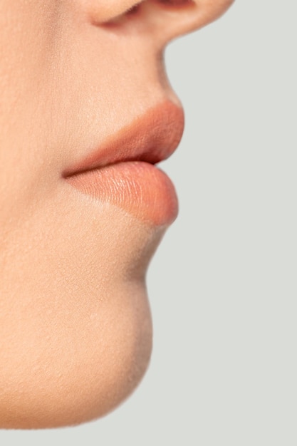 Close up portrait of beautiful jewish woman isolated on studio background.