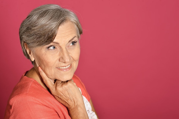 Close up portrait of beautiful smiling senior woman posing