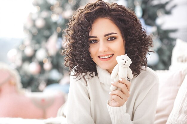 Close up portrait of beautiful woman on christmas 