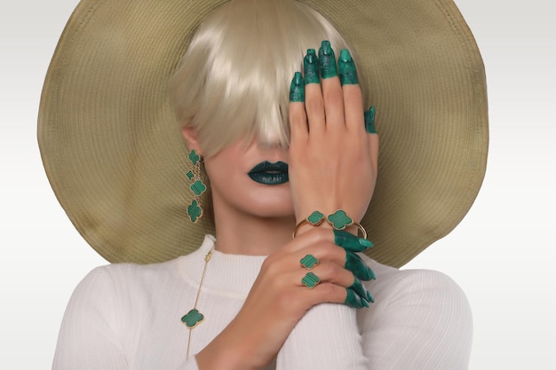 Close up portrait of beautiful woman with jewellery and hat