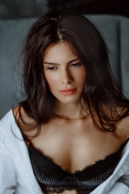 Close-up portrait of beautiful young brunette woman