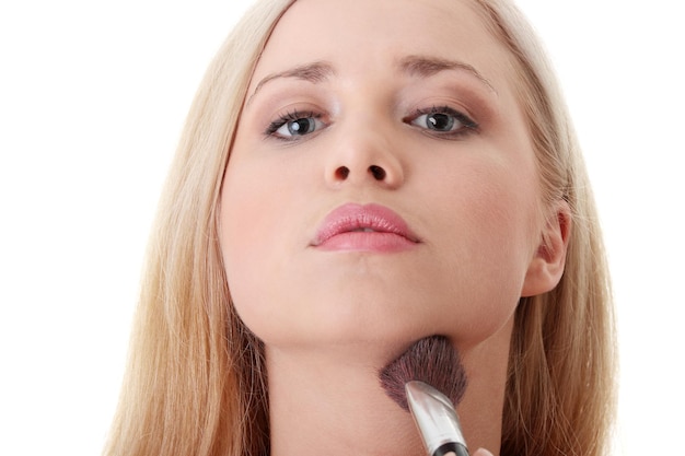 Photo close-up portrait of a beautiful young woman over white background