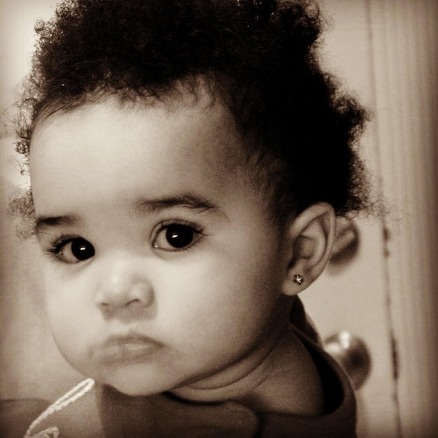 Photo close-up portrait of cute baby girl