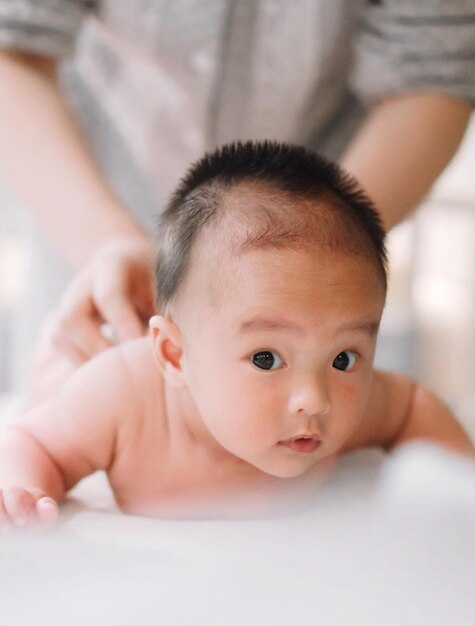 Photo close-up portrait of cute baby at home