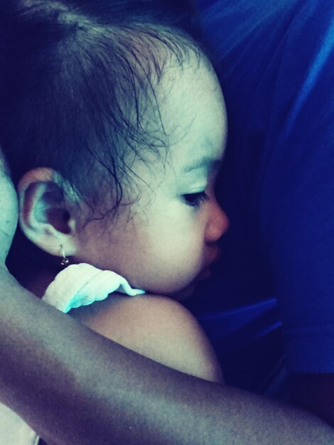 Close-up portrait of cute baby sleeping