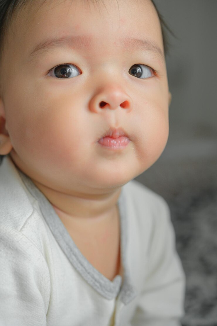 Photo 귀여운 아기의 클로즈업 초상화