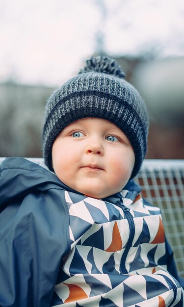 Photo close-up portrait of cute boy wearing hat