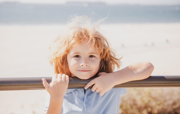 Close up portrait of a cute little child boy outdoor Childhood and parenting concept