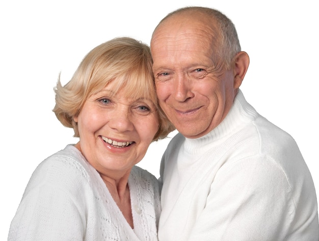 Close-up portrait of an elderly couple hugging