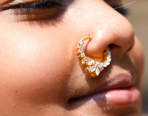 Close-up portrait of girl wearing nose ring