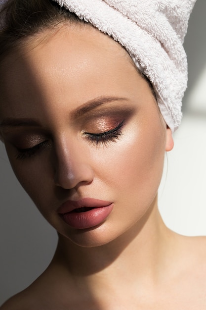 Close-up portrait of a girl with make-up.