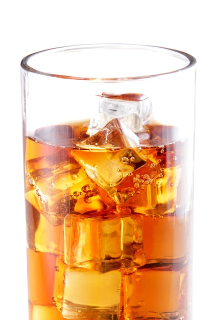 Close up portrait of a glass of ice tea with many ice cubes