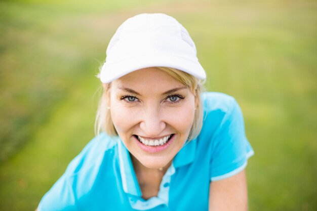 Close-up portrait of golfer woman