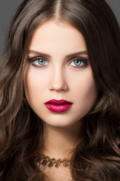 Close-up portrait of gorgeous young brunette woman