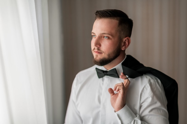 Close up. portrait of a handsome man with a bow tie