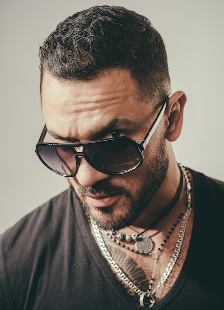 Close up portrait of Handsome young man with sunglasses.