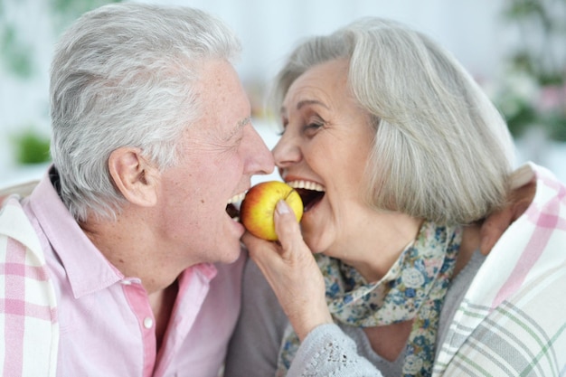 Close up portrait of happy senior couple having fun