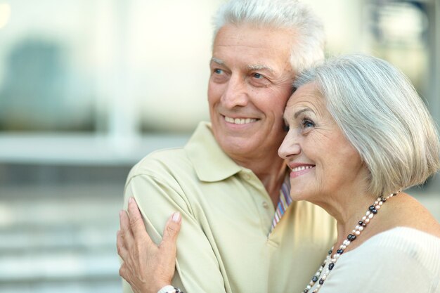 Close-up portrait of a happy senior couple outdoor