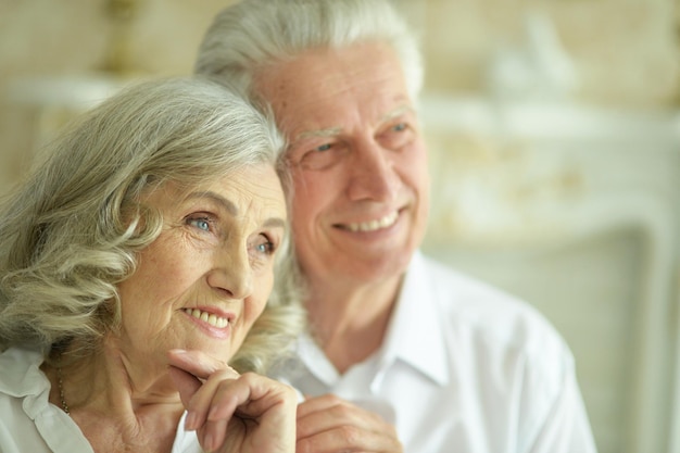 Close up portrait of happy senior couple posing