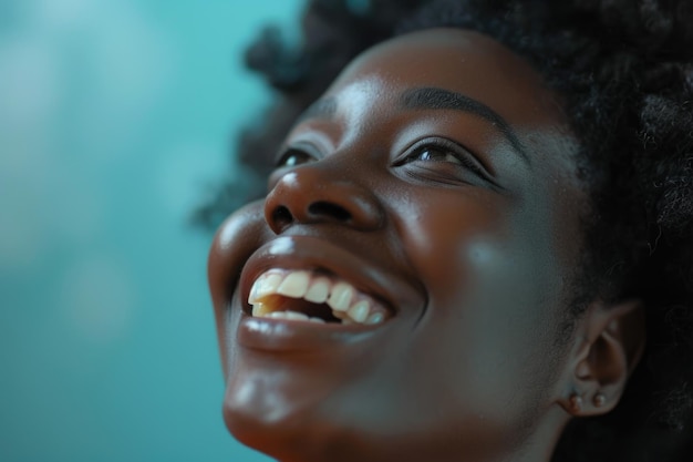 Close up portrait of a happy young african american woman laughing