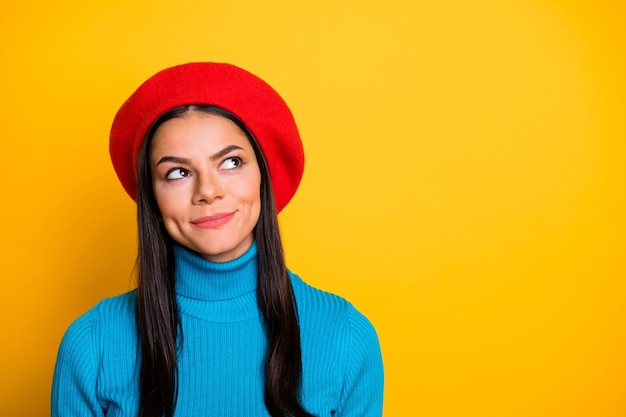 Close-up portrait of her she nice-looking attractive lovely cute creative curious cheerful cheery brunet girl thinking creating idea isolated over bright vivid shine vibrant yellow color wall