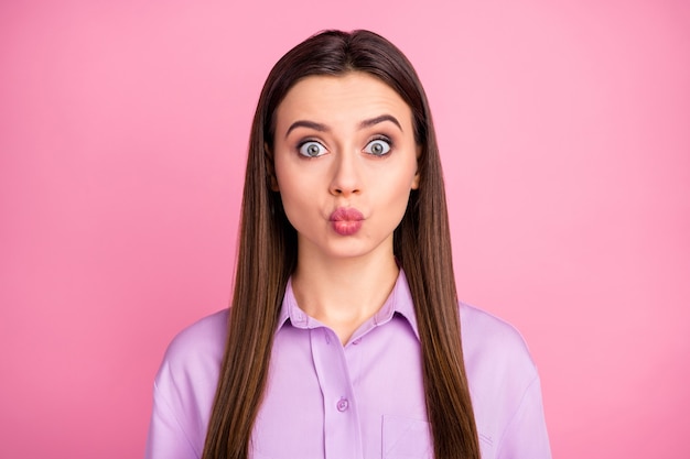 Close-up portrait of her she nice-looking attractive lovely pretty cute lovable funny winsome straight-haired girl sending air kiss isolated over pink pastel color background