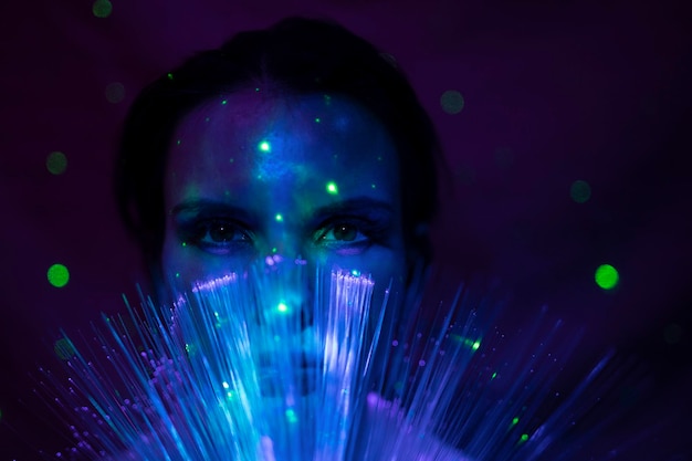 close-up portrait of illuminated lighting equipment against black background