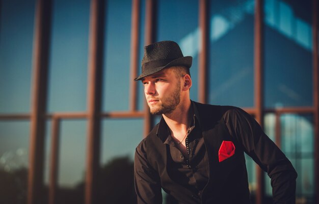 Close-up portrait of a man in a hat with a beard. hipster.