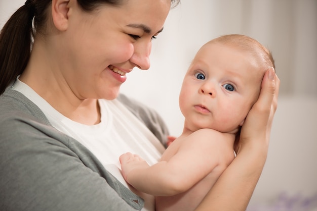 Close up portrait of mother and her newborn baby. Healthcare and medical love woman lifestyle mother's day concept.