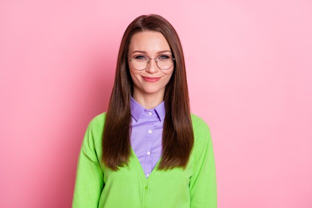 Close-up portrait of nice attractive shy cheery girl lecturer nerd wearing specs isolated over pink pastel color background
