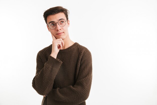 Close up portrait of a pensive young man in sweater