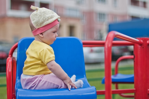 Close up on portrait of the playing little girl